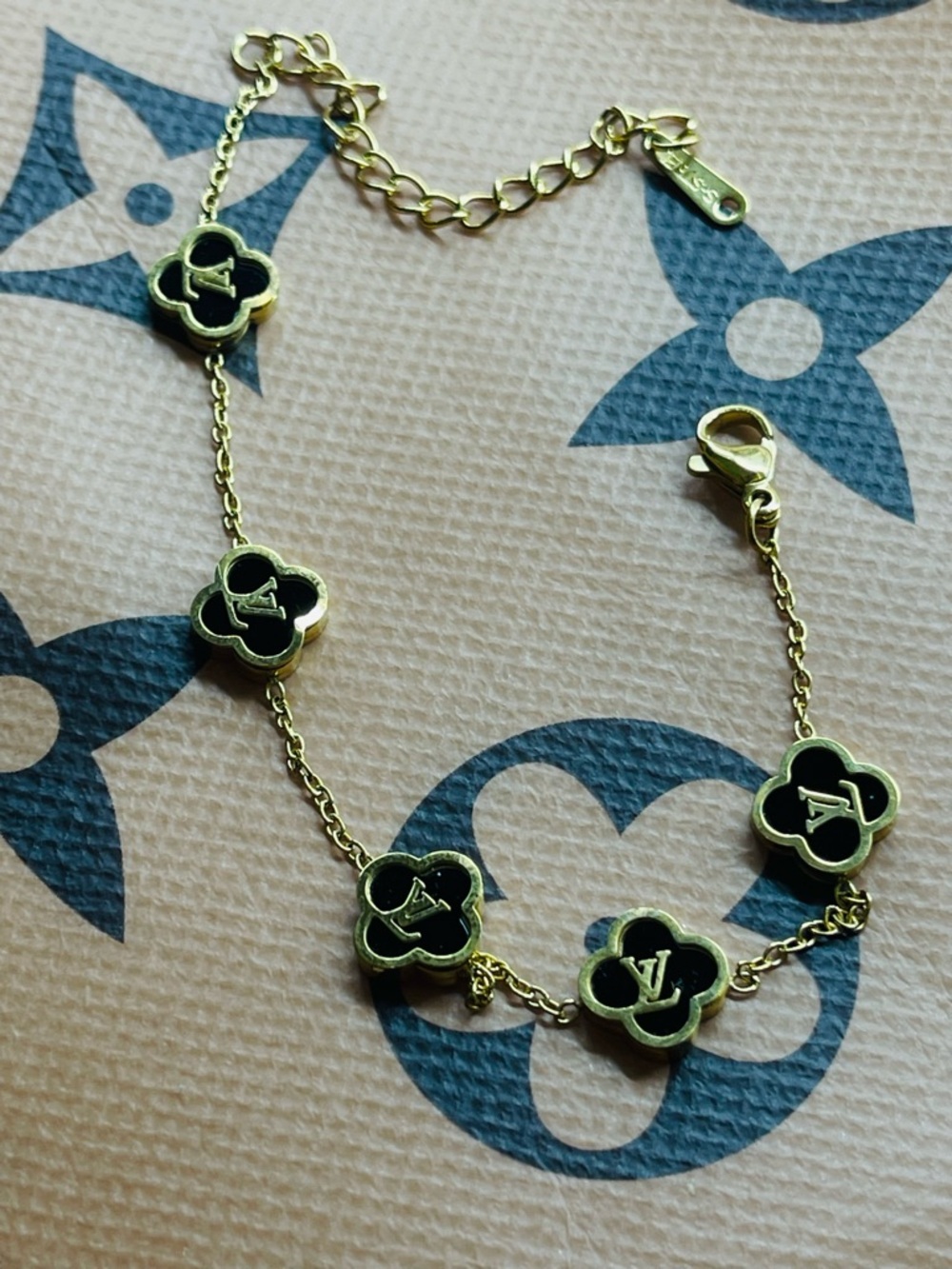 Gold stainless steel Bracelet with Black Monogram Flower Charms